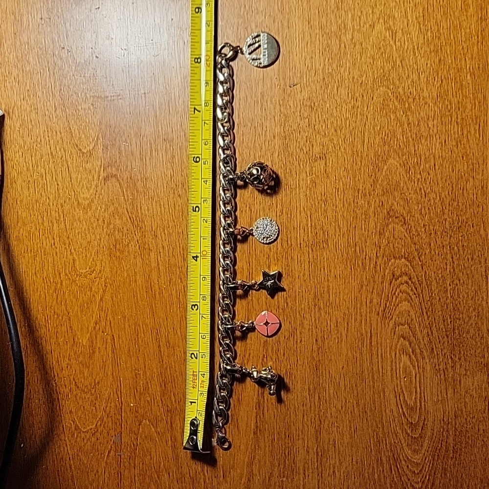 Fossil gold tone curb link charm bracelet
